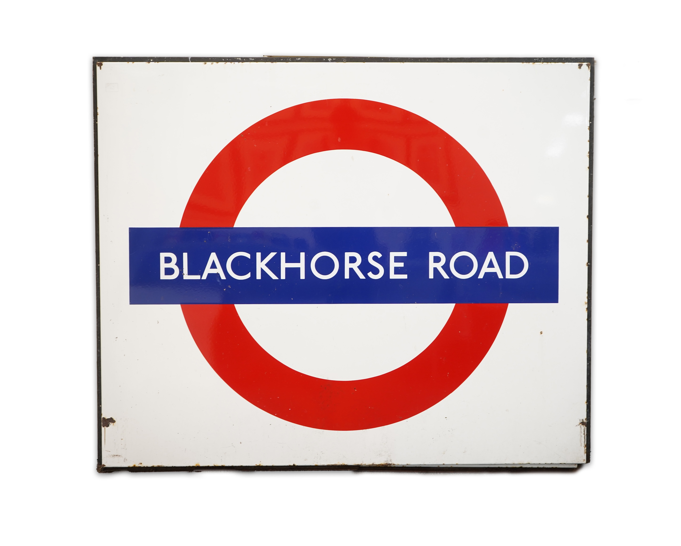 A 1950s/60s London Underground enamel bullseye station sign for Blackhorse Road by Burnham and Co., 107cm wide, 107cm high, attached to a slim angle iron frame, overall dimensions 131cm wide, 111cm high